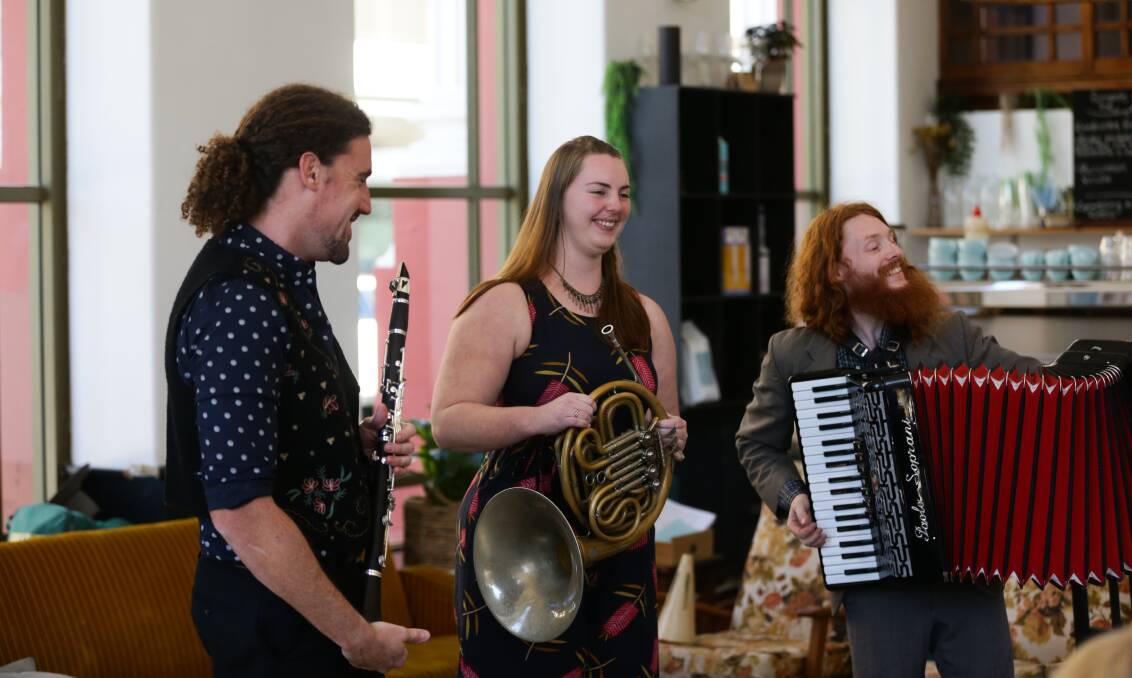 Gypsy folk: Baltic Bar Mitzvah band members Aidan Quinn, Hannah Murray and Neil Simpson at Cafe Momo. Picture: Jonathan Carroll