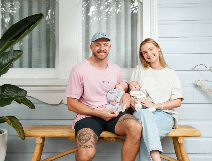 So happy together: Mitch and Emily with babies Bodhi and Bobbi. Picture: Max Mason-Hubers