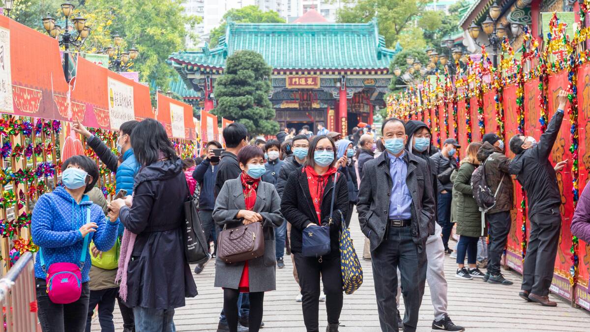 Hong Kong: People wearing masks in Hong Kong in January to prevent the spread of COVID-19.