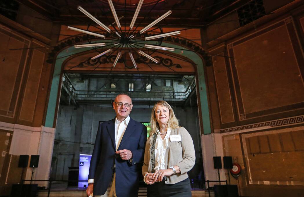 Century Venues executive director Greg Khoury in the Victoria Theatre with University of Newcastle academic researcher Dr Gillian Arrighi.