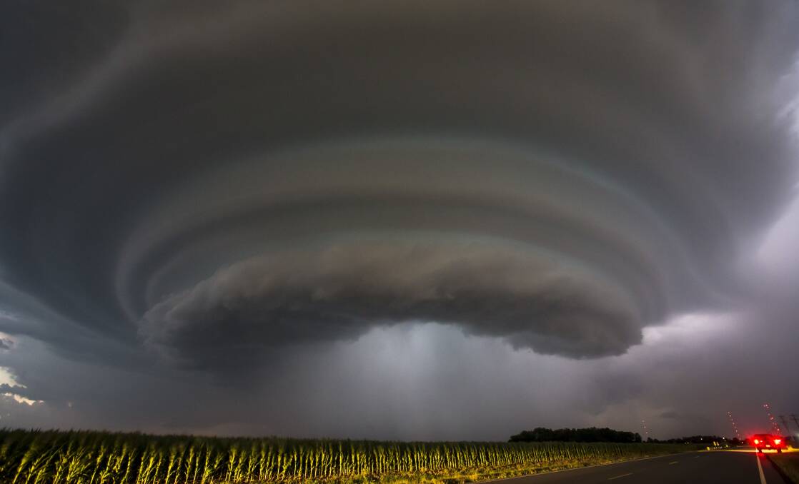 Wild Weather: A severe thunderstorm makes its way towards Wichita, Kansas. Travis Heying, a photographer with The Wichita Eagle newspaper, captured the scene while he was chasing thunderstorms. Picture: Travis Heying, The Wichita Eagle, courtesy of AP