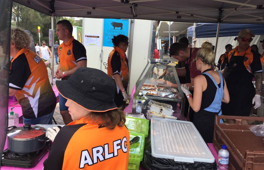 Ready to serve: The Aberdeen Rugby League Football Club sausage stand in the middle of the Supercars track.