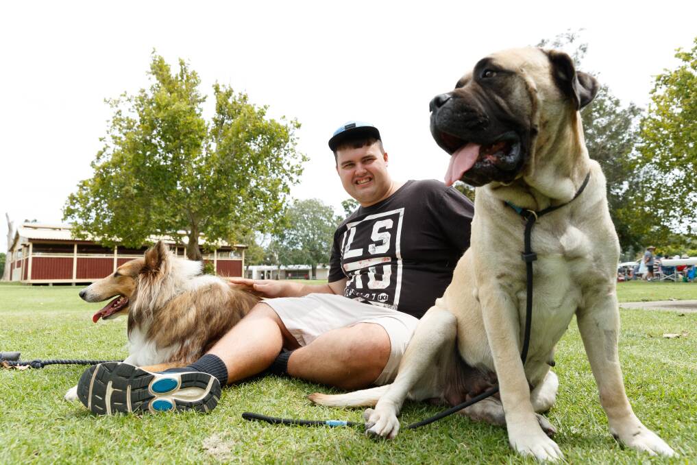 TEAM: My Goal participant Andrew Martin with rescue dogs Sullivan and Sassy. Picture: Max Mason-Hubers