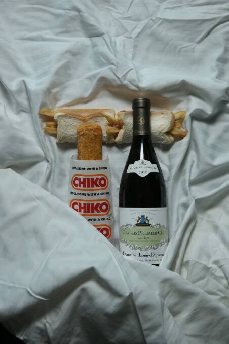 International relationship: Chiko roll & French Chablis. Picture: Simone De Peak