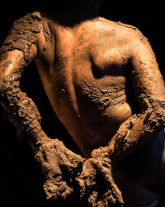 INNER BATTLE: Chan's ethereal statue emerges from the mud.