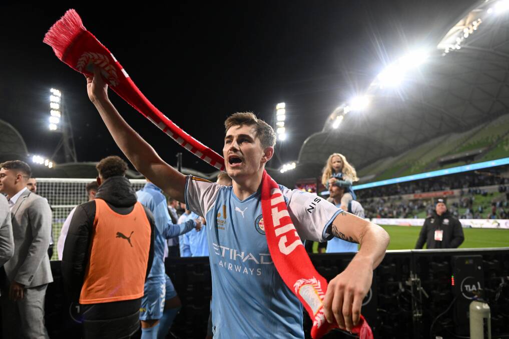 CITY BOY: Metcalfe proudly wearing a City scarf. Picture: AAP