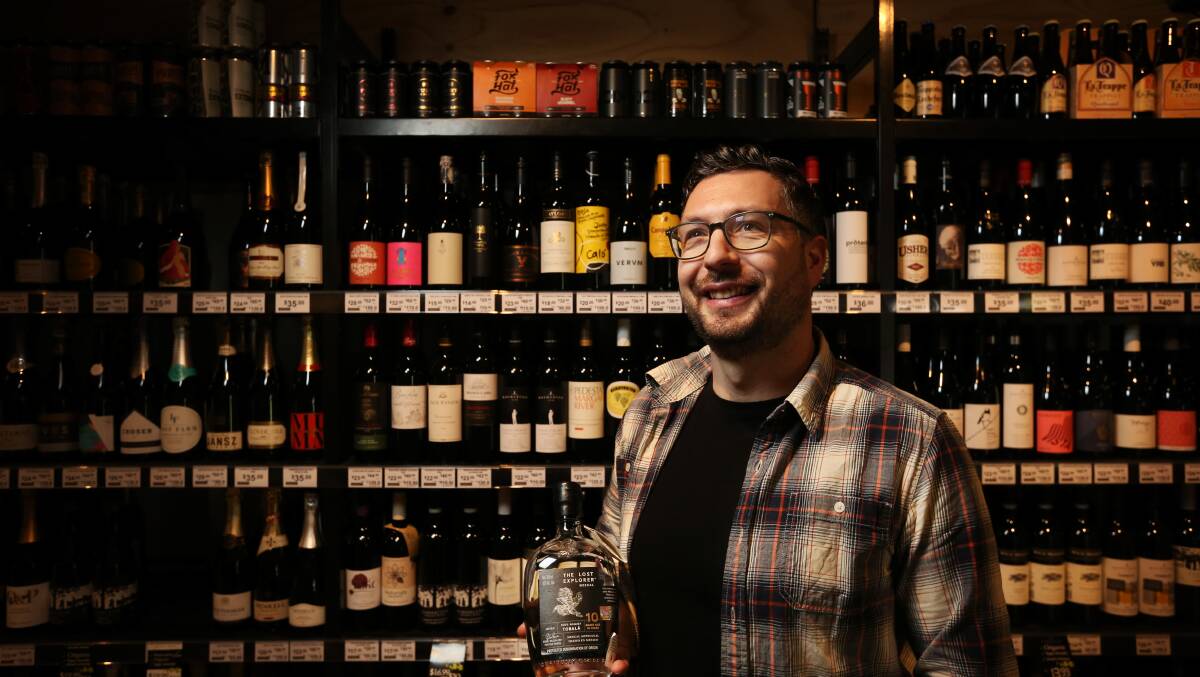 Catering to needs: Collin Hollibone store manager at Tighes Hill Cellars. Picture: Simone De Peak