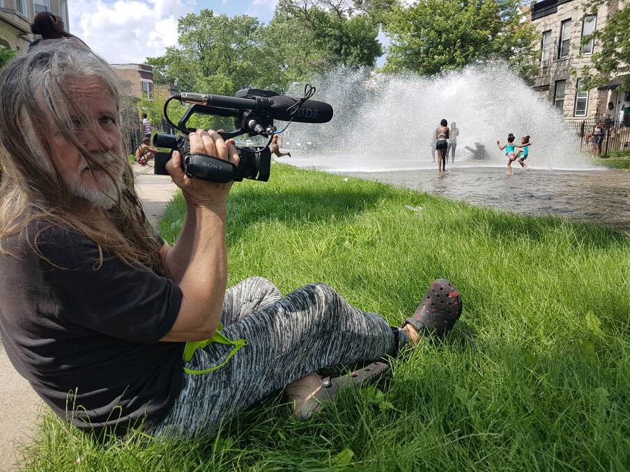In the heart of it: George Gittoes filming White Light in the south side of Chicago.