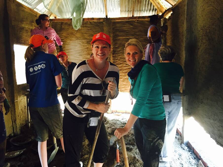 Every act counts: Far left, Melissa Histon-Browning and Belinda Smith working with Habitat for Harmony in Nepal. 