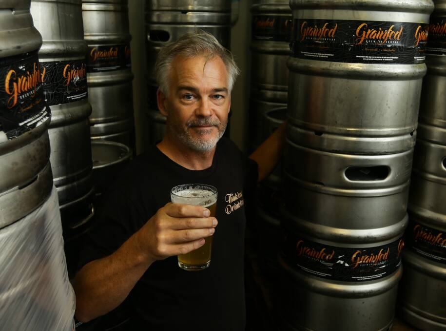 King of beers: Lachlan MacBean's Grainfed Brewing produces local tap favourite, Sneaky One, as well as 3 Sons Red IPA and East Coast Pale. Picture: Jonathan Carroll