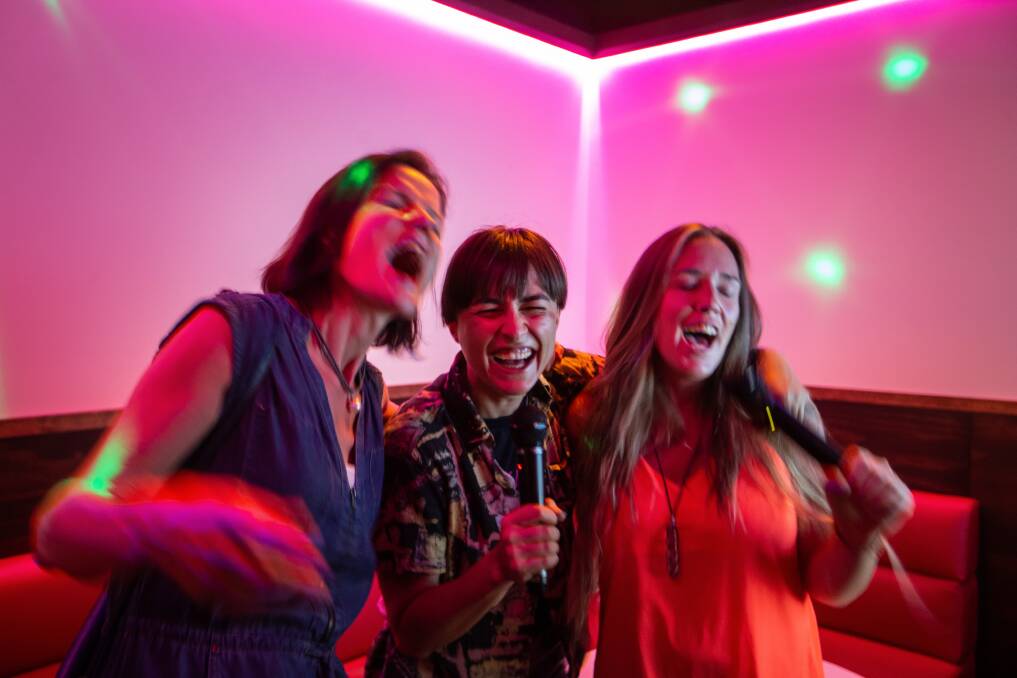 FEELING IT: Marion Surmund, Victoria Petrovsky and Sam Miles belt out a tune.