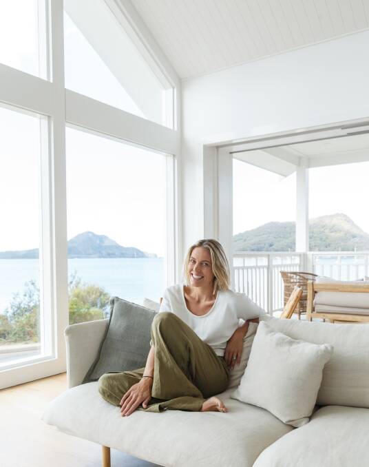 Dream Home: Lauren Charge in the loungeroom of Salt 1 with its spectacular view to Tomaree Head.