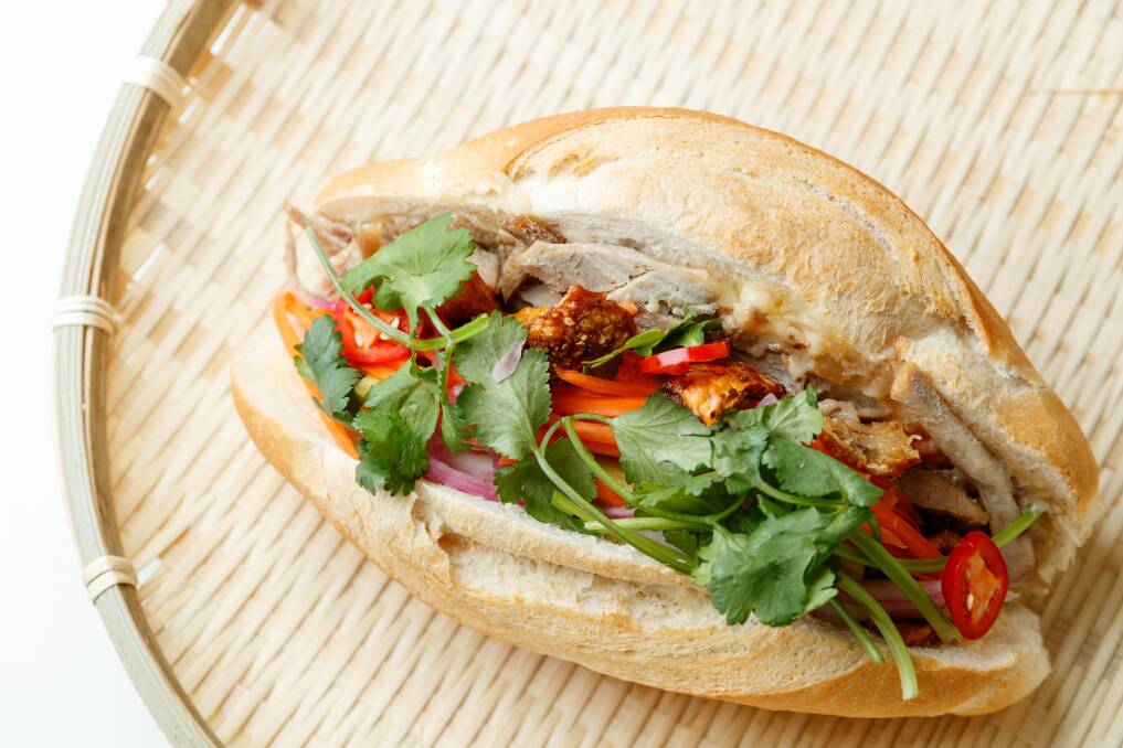 Taste sensation: Roast pork and crackling banh mi, at Banh Mi 233 cafe on Hunter Street. Pictures: Max Mason-Hubers 