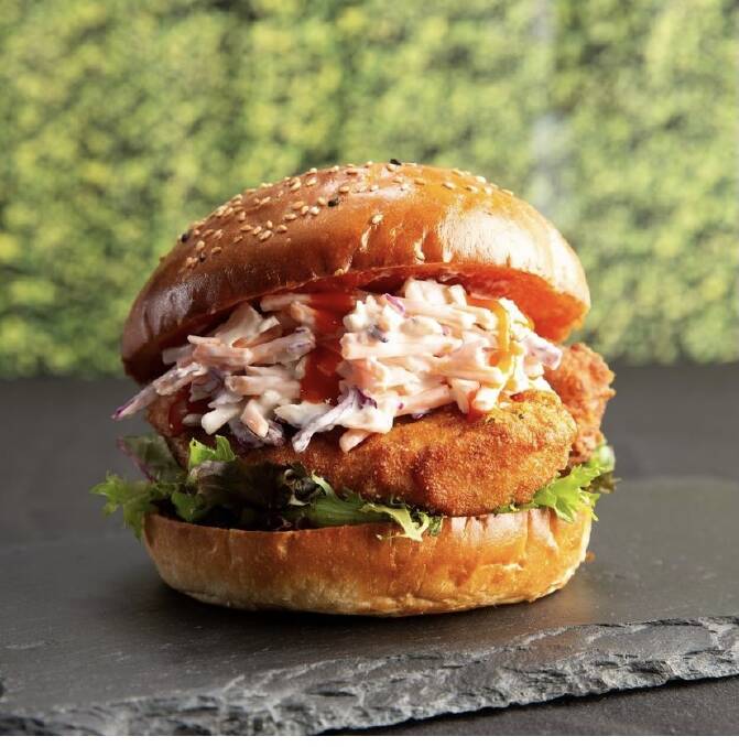 BURGERS WITH BITE: A spicy fried chicken burger with slaw.