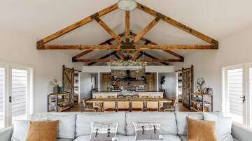 Functional in every way: The kitchen in the main pavilion at Farmhouse on Oxley Island. Picture: Nat Spada from The Palm Co
