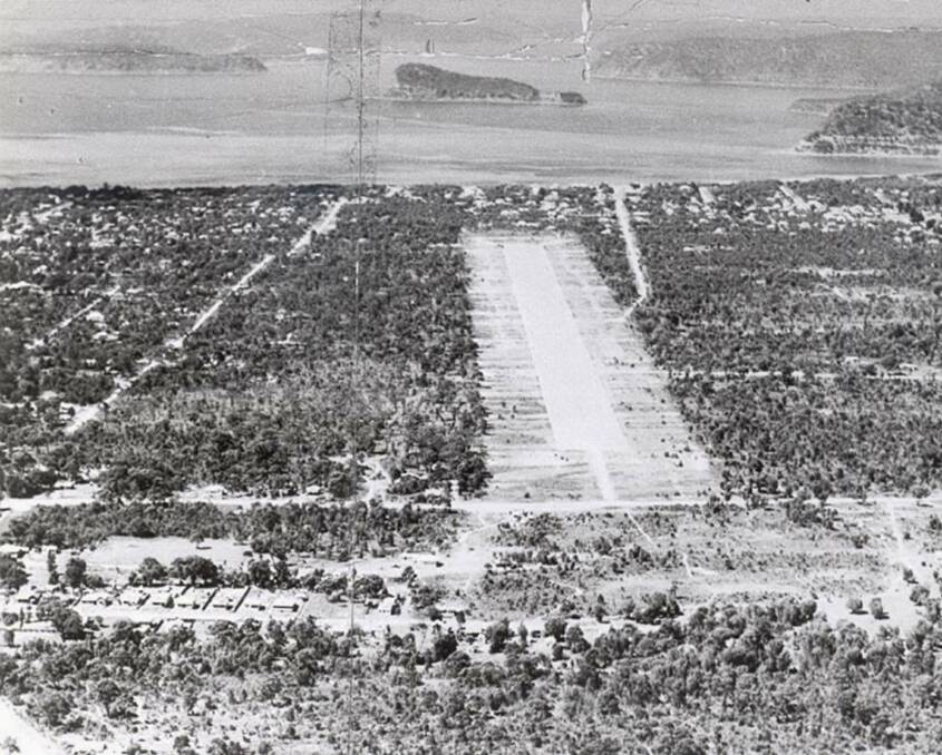 Happy landing: Woy Woy's lost airfield seen in this 1944 aerial photo looking south towards Lion Island. Picture: Gosford City Library