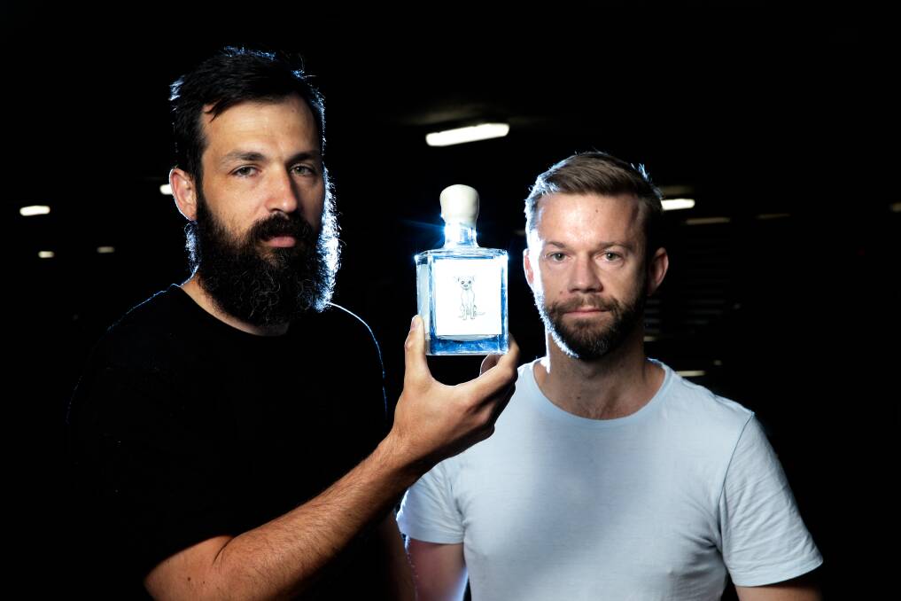 First Australian tequila: James Becker and Mark McShaddock with a bottle of their Pinche product. Picture: Jonathan Carroll
