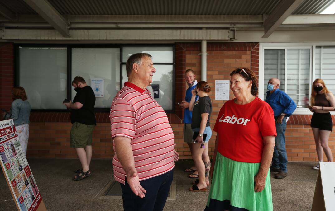 TO THE POLLS: Outgoing Labor councillor Henry Meskauskas and incumbent mayor Loretta Baker at the polling booth at Rutherford Technology High on Saturday. Picture: Simone De Peak