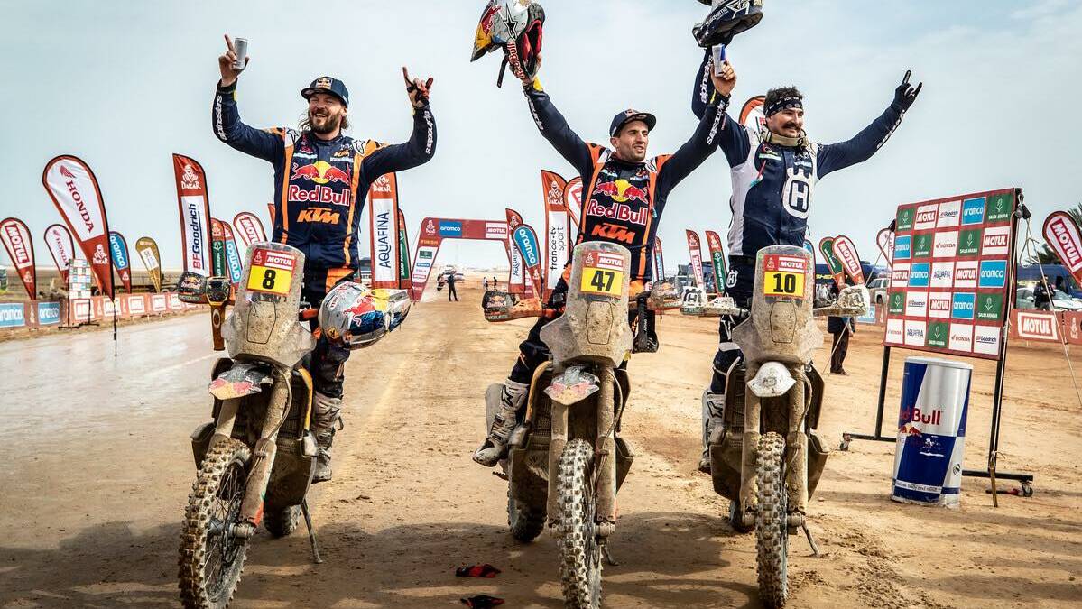 Topy Price (second), Kevin Benavides (first) and Skyler Howes (third) share the podium at the end of the 2023 Dakar Rally. Picture courtesy of Dakar Rally.