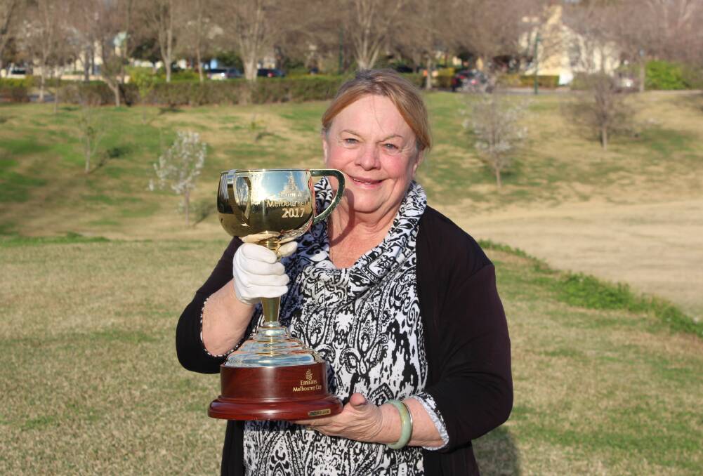 ON TOUR: Wendy Green, part-owner of 1999 Melbourne Cup winner Rogan Josh, with the Melbourne Cup. 