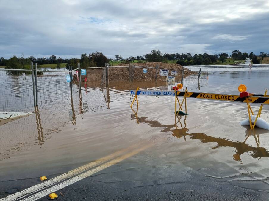 FLOOD WATER: Water near the earthworks for the new road at Testers Hollow on July 7. The flood level is higher than the April 2015 storm, when Testers Hollow was closed for 16 days. Picture: Raise Testers Hollow (Facebook)