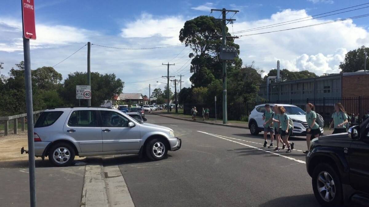 RUSH HOUR: Whitebridge High students negotiate the traffic on Lonus Avenue, one of the congestion points cited by advocates of a new shared path from Charlestown to the Dudley coast.