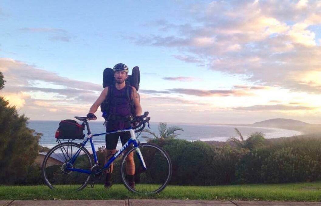 MEMORIES ON TWO WHEELS: Jordan Shafer, of Phoenix, USA, rode for five days between Sydney and Canberra on his Giant road bike, which was stolen in 2015 from outside a laundromat in Mayfield and recovered this week.