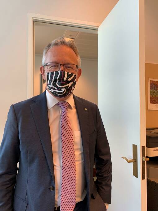 Member for Bean David Smith wears a face mask from local designer Darkies Design. Picture: Supplied
