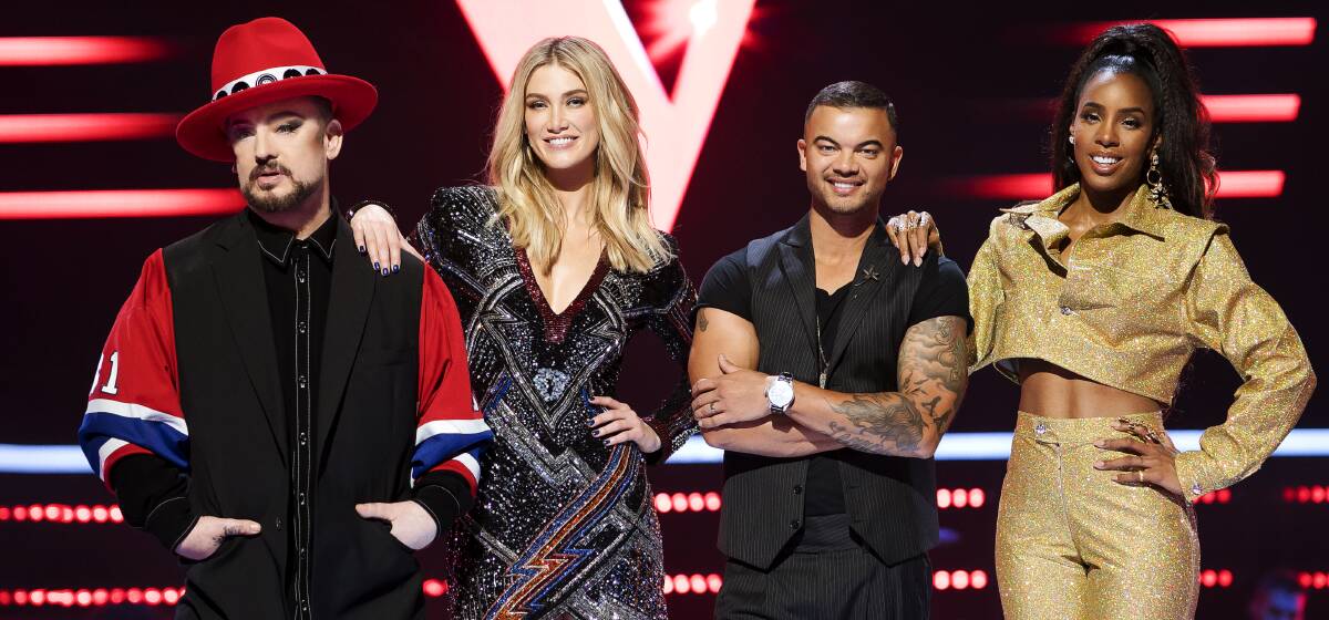 FRIENDS AND RIVALS: Goodrem with Boy George, Guy Sebastian and Rowland during last year's season of The Voice Australia. 