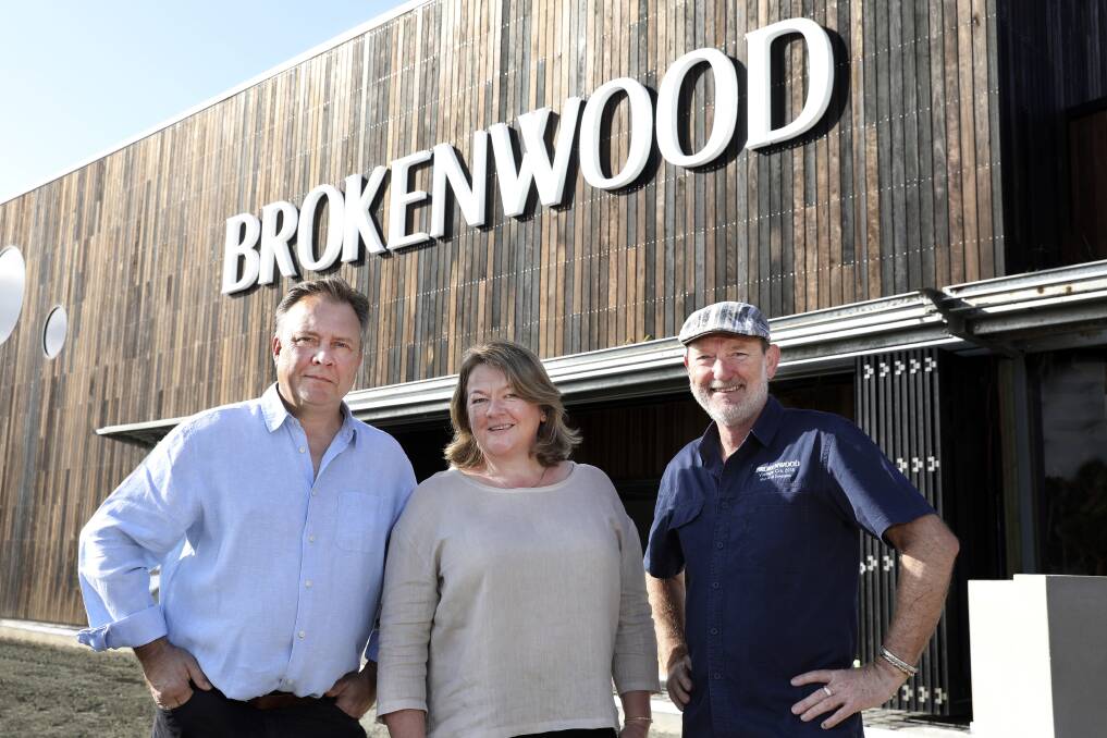 FRESH START: Brokenwood CEO-chief winemaker Iain Riggs (right) with Andrew and Janet Wright. Picture: Chris Elfes