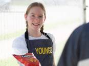NEW IDEA: Scarlett Young serving a customer of Youngs Food Trikes. Picture: Supplied