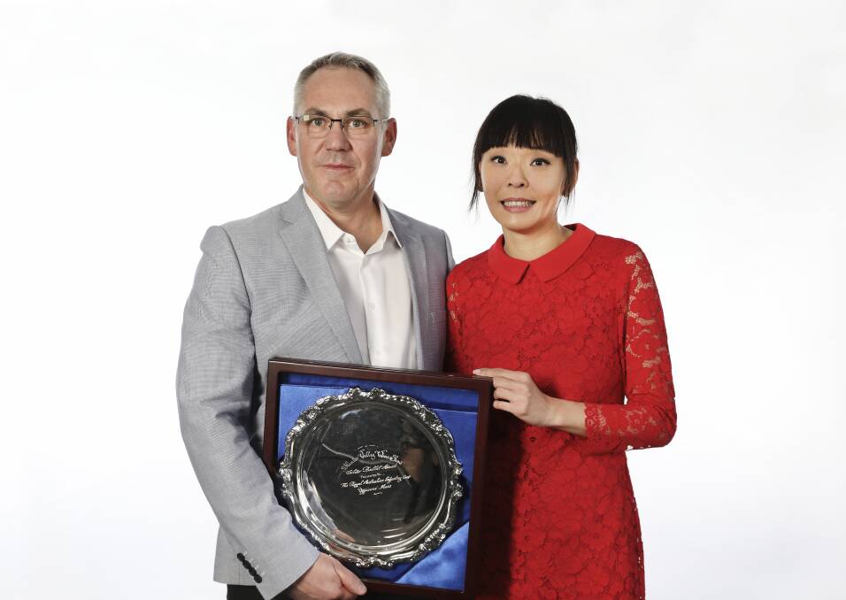 ON TARGET: International judge Corrine Mui  presents the Silver Bullet Trophy to Tyrrell's red winemaker Mark Richardson at the 2018 Hunter Valley Wine Show. Picture: Chris Elfes