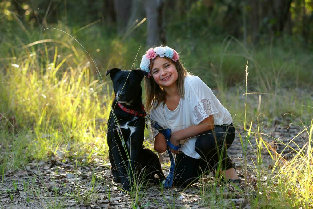 Thalia Standley and her dog, Simba. Picture: Jonathan Carroll