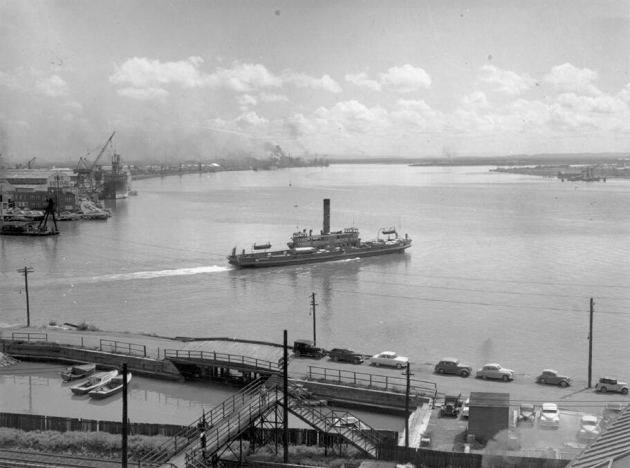 RARE SIGHT: The punt Lurgurena travelling to Stockton from its Wharf Road berth in 1960. 