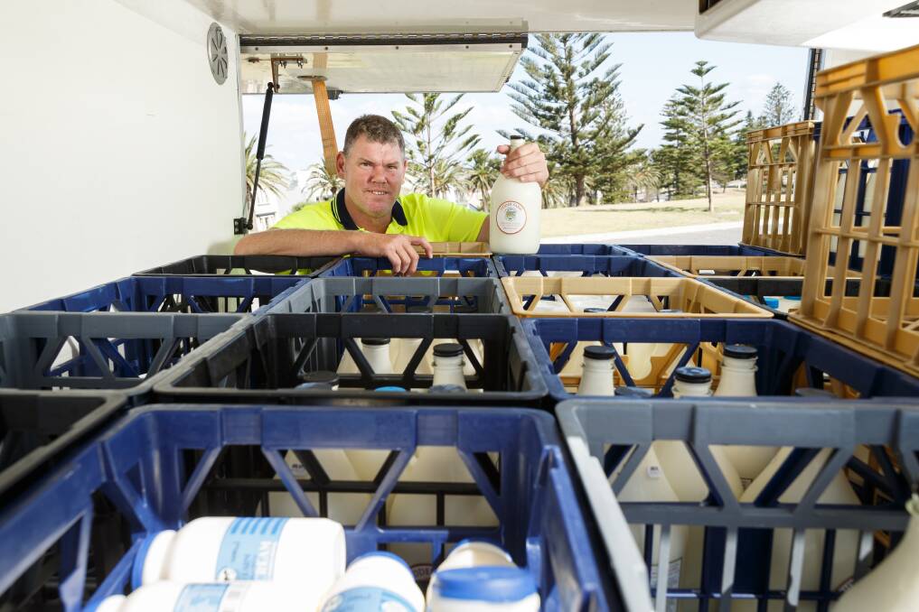 ON A ROLL: Peter Butcher, of The Milkman's Back, with Udder Farm products he delivers to homes and businesses. Picture: Max Mason-Hubers
