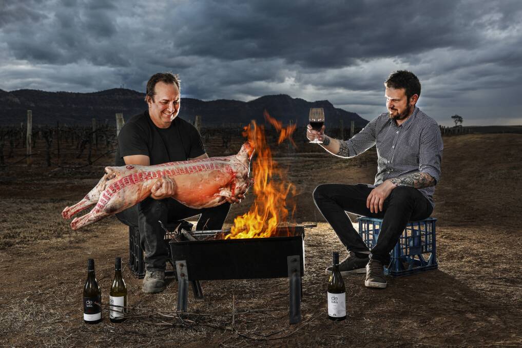 FUN DAY OUT: Winemaker Mike De Iuliis and chef/butcher Michael Robinson are fired up for Cork & Fork at De Iuliis Winery on August 10. We have a double pass to give away. Picture: Elfes Images (www.elfesimages.com)