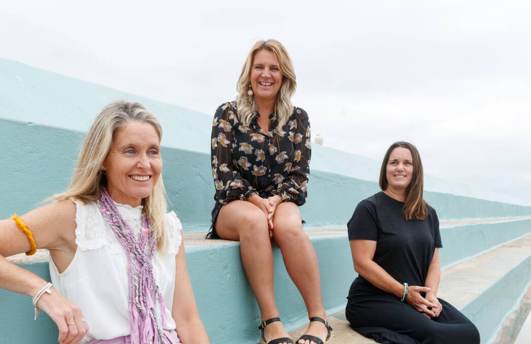 Salty friends: From left, Suz Bailey, Annalisa Lawrence and Jessica Blacklow at Newcastle Ocean Baths. Picture: Max Mason-Hubers 
