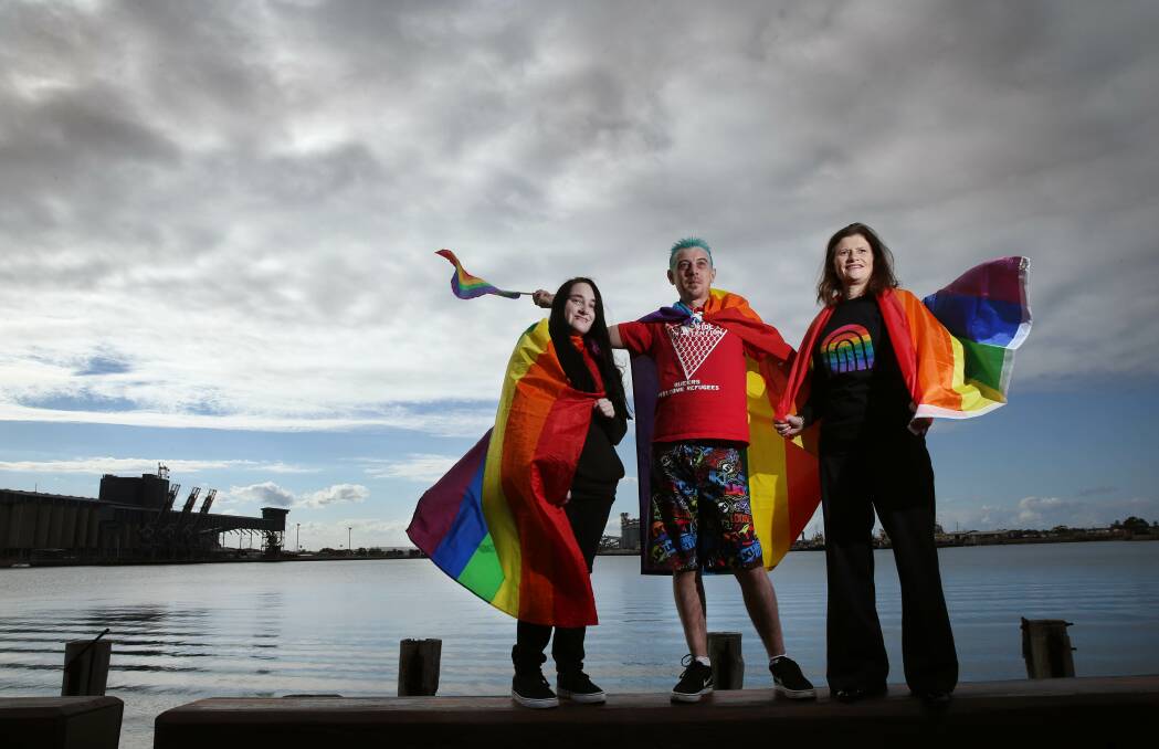 RAINBOW CITY: Serriah Woolard, Aaron Hargrove and Fiona Tearne get in the Newcastle Pride spirit. Picture: Marina Neil