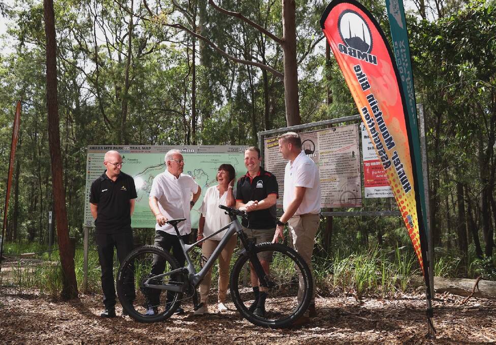 AusCycling spokesman Ed Reddin, Lake Macquarie MP Greg Piper, mayor Kay Fraser, HMBA president Josh Bridson and Destination Sydney Surrounds North spokesman Michael Forster. Picture by Marina Neil