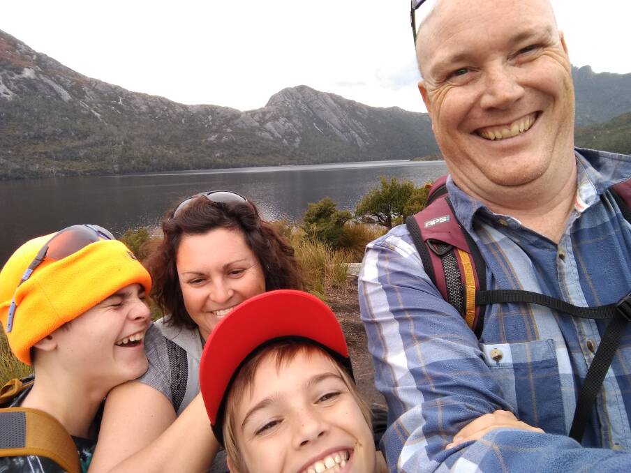 Hamish (left) lives with autism. He's pictured on holiday in 2019 in Tasmania with mum Tracy, brother Harrison and dad Walter. Picture supplied 