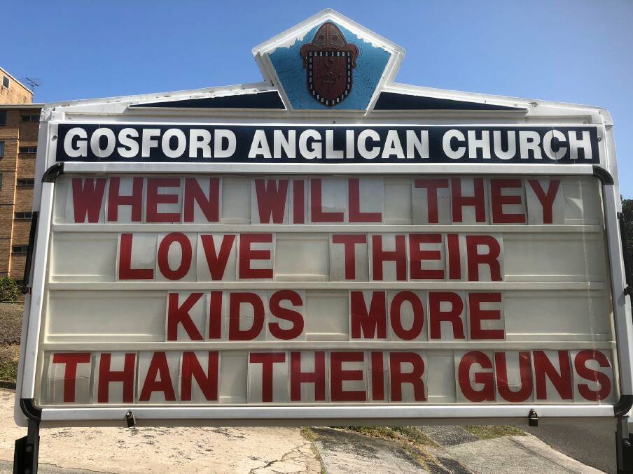 A sign at a Gosford church about guns. 