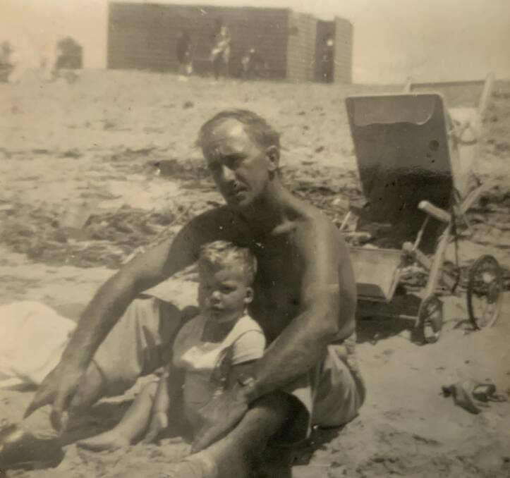 Memory Lane: Gary Lawless as a baby with his dad at Stockton beach. 