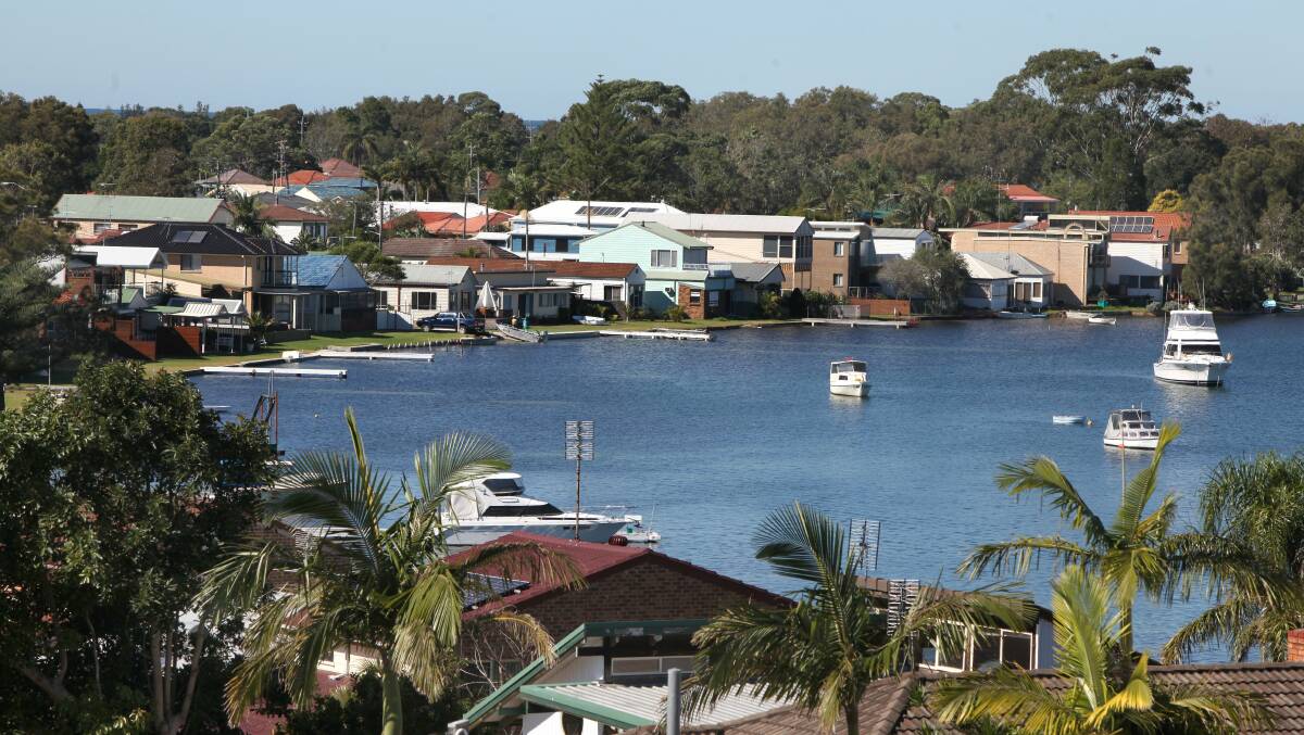 Low-lying homes along the foreshore at Marks Point in Lake Macquarie. Picture: Phil Hearne. 
