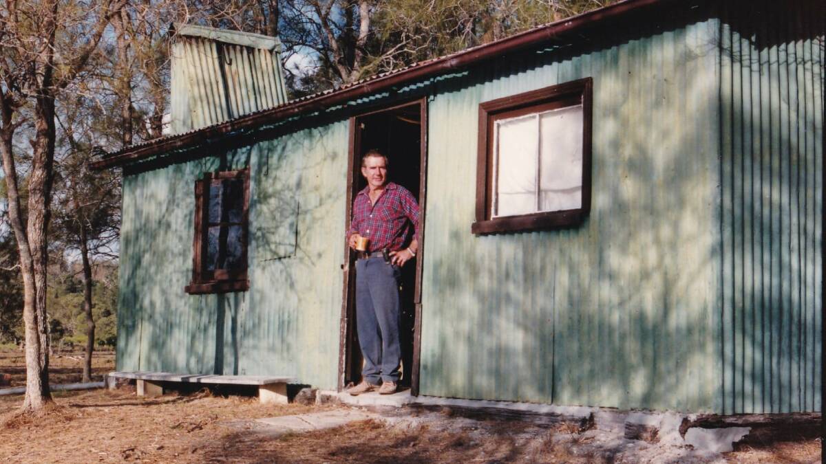 Dave Skelton at the hut he and his brother Bob built on the Karuah River. 