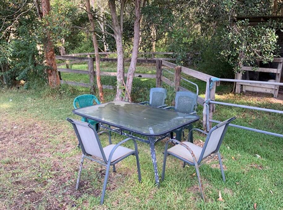 Grab a Chair: The 'Table of Knowledge' at the Seahampton property of Gary Lawless.    