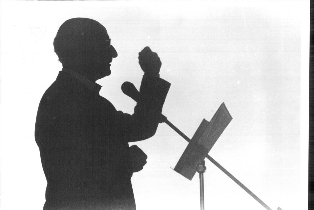 Poetic Licence: A silhouette of David Malouf giving a reading at the Museum of Contemporary Art at The Rocks. 