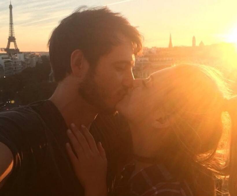 Morgan Evans and Kelsea Ballerini locking lips in Paris, the City of Love. 