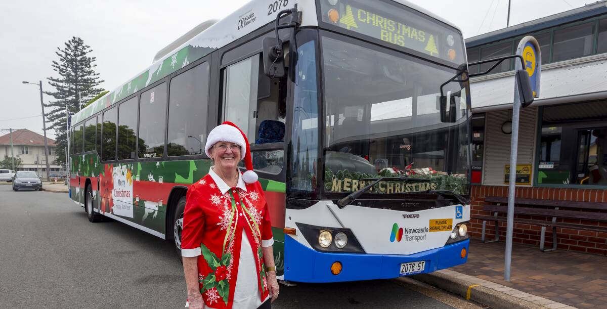 Christmas Cracker: Marg Parnell with her much-loved Christmas bus. "I just love to see the smiles on everyone's faces when they step on board," she said. 