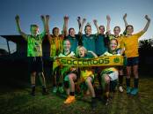 Victory: Youngsters celebrate the Socceroos victory at Adamstown on Tuesday. Front: Kalani, Jadson and Jordie Dinnery. Back: Hudson Dart, Michaela Bird, Ruby Murray, Tayah McVittie, Hanna Mounter, Lila Walker and Ava Lewis. Picture: Marina Neil  