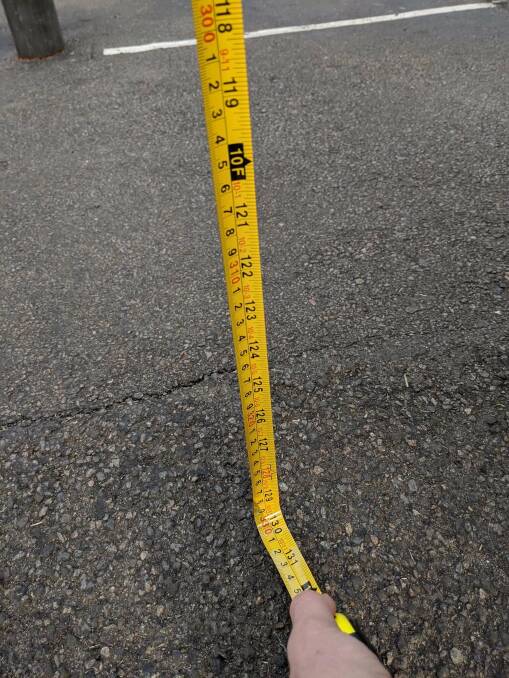 Gaffe: The tape measure shows the hoop's extra height. 